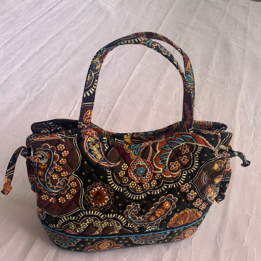 Vera Bradley tote with attachable pocket wallet.